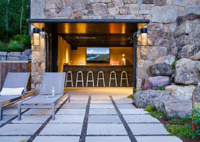 Outdoor kitchen exterior photo of Bear Mountain Builders Bonfire Beach house project